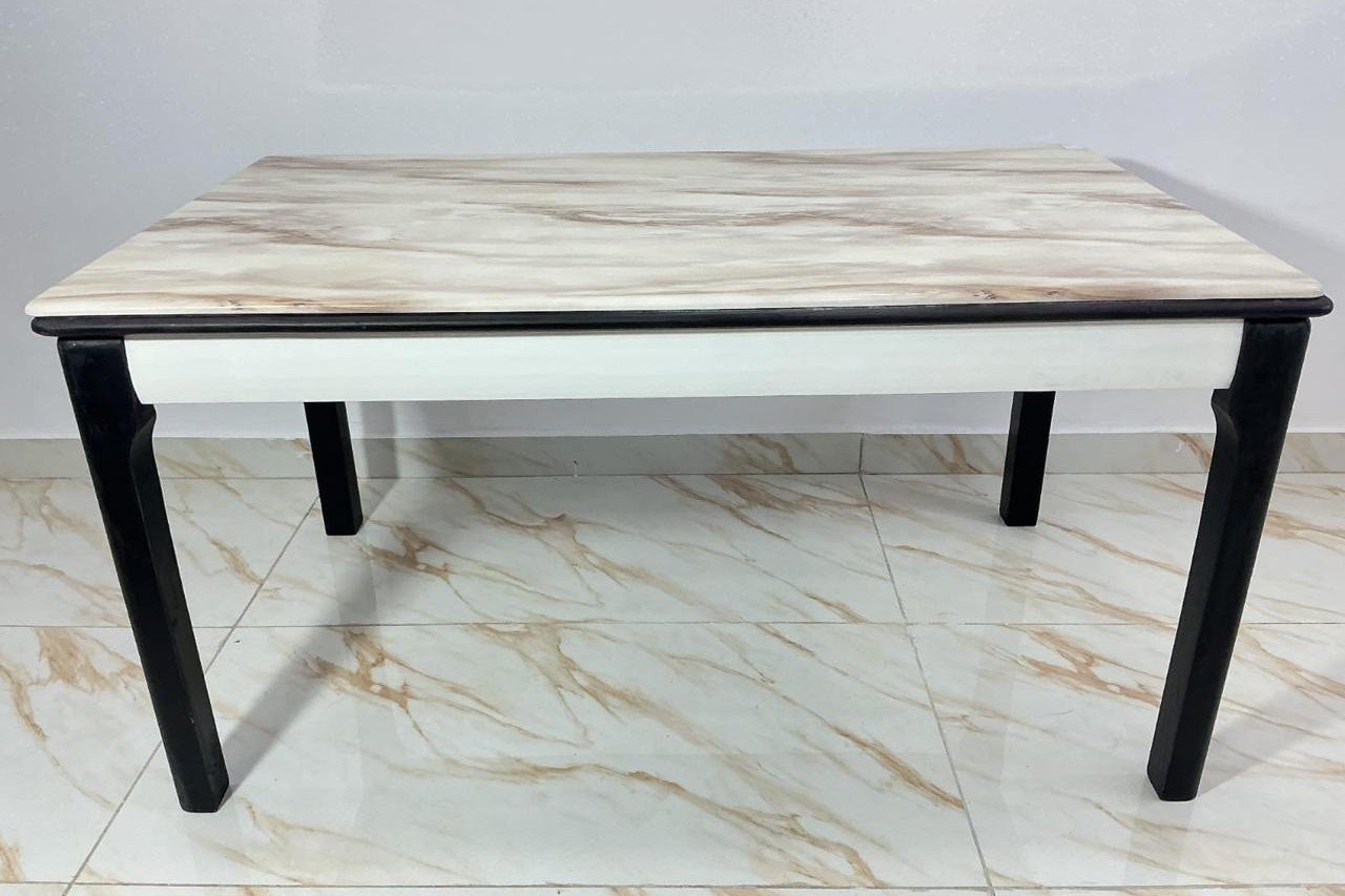 Six seater dining table with a marble top and dark timber legs, made in Hyderabad