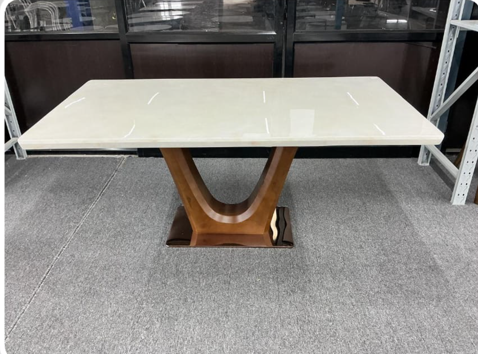 Expandable marble dining table with extension leaves